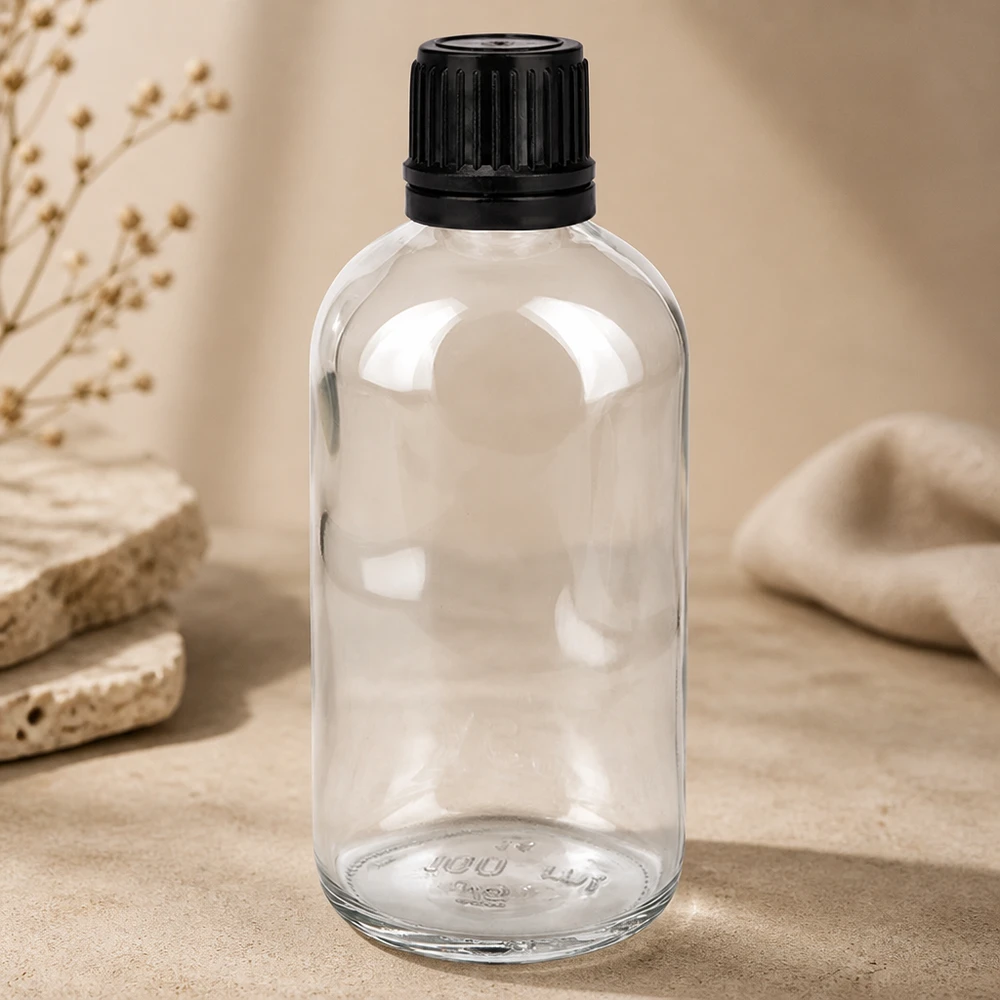 100ml globulipullo 3mm kaaderengas musta vakiosuljin ClearLine UT18/1 ClearLine UT18/1 100 ml:n apteekkipullo, kirkasta lasia, mustalla lapsiturvallisella kierrekorkilla