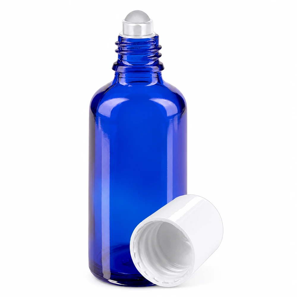 50 ml:n sininen roll-on-pullo apteekkilasista, valkoisella korkilla ja rullapallosovittimella