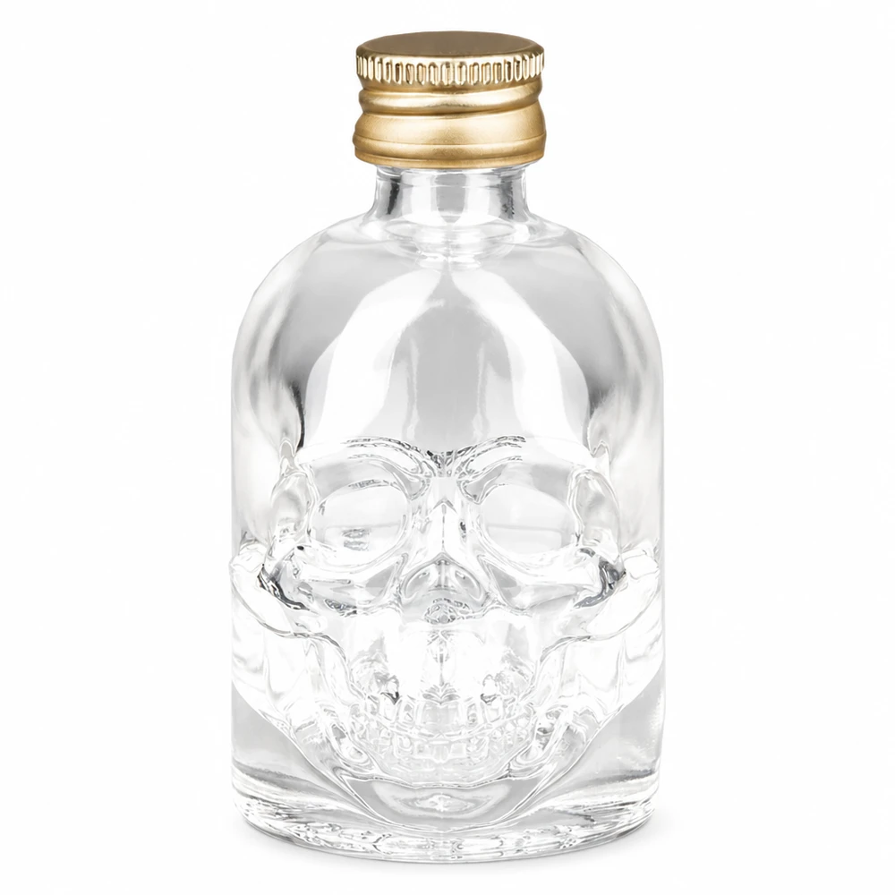 50ml Glasflasche "Hector" + Schraubverschluss gold UNiTWIST 50ml Hector-lasipullo, jossa on pääkallomuotoilu ja kultainen UNiTWIST-kierrekorkki väkeville alkoholijuomille ja juomille.