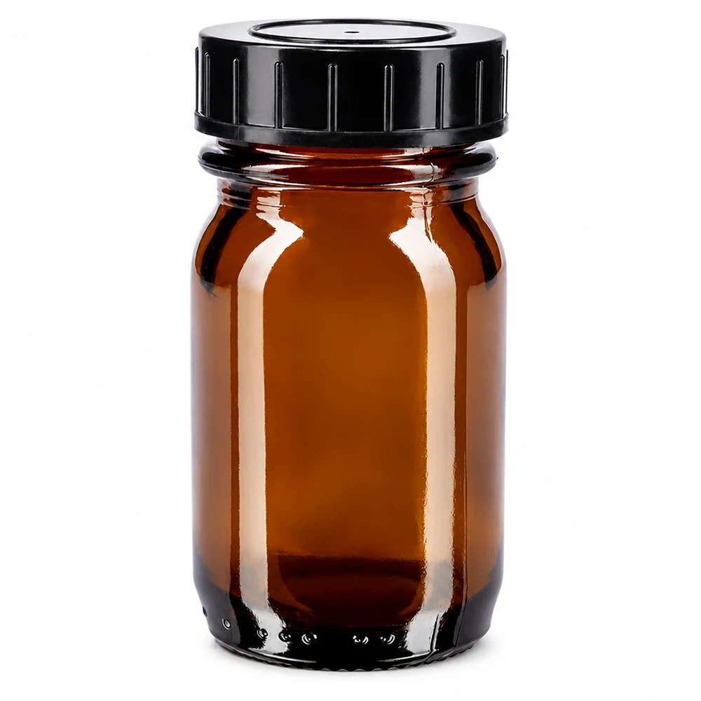 30ml leveäkaulainen meripihkainen lasipullo, jossa on kierrekorkki. 30 ml:n laajakaulainen pullo, joka on valmistettu meripihkalasista ja jossa on musta kierrekorkki turvallista säilytystä varten.
