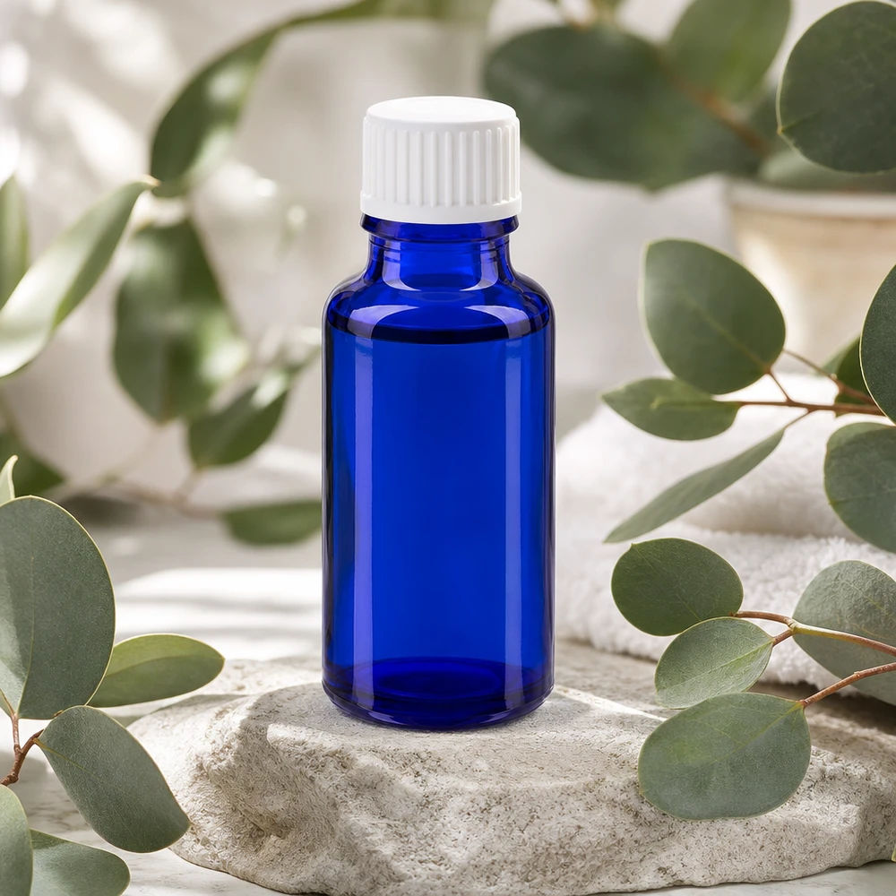 Apteekkipullo sininen 20ml ruuvikorkki valkoinen globen standardi Pieni sininen 20 ml:n apteekkipullo UV-suojalasista, valkoisella kierrekorkilla ja luonnonkivellä