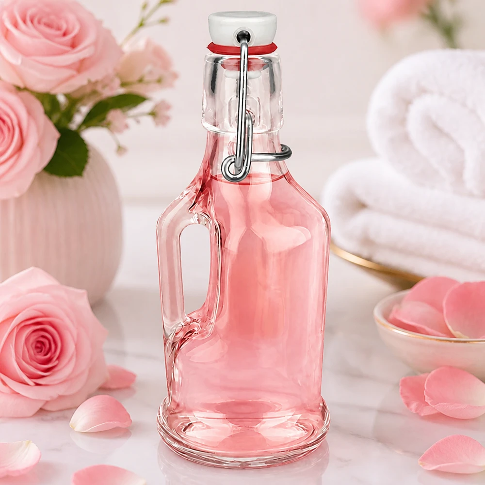 200ml lasipullo Bertha pinkki sävytetty romanttinen koristelu ruusuilla ja terälehdillä, UNiTWIST korkki.
