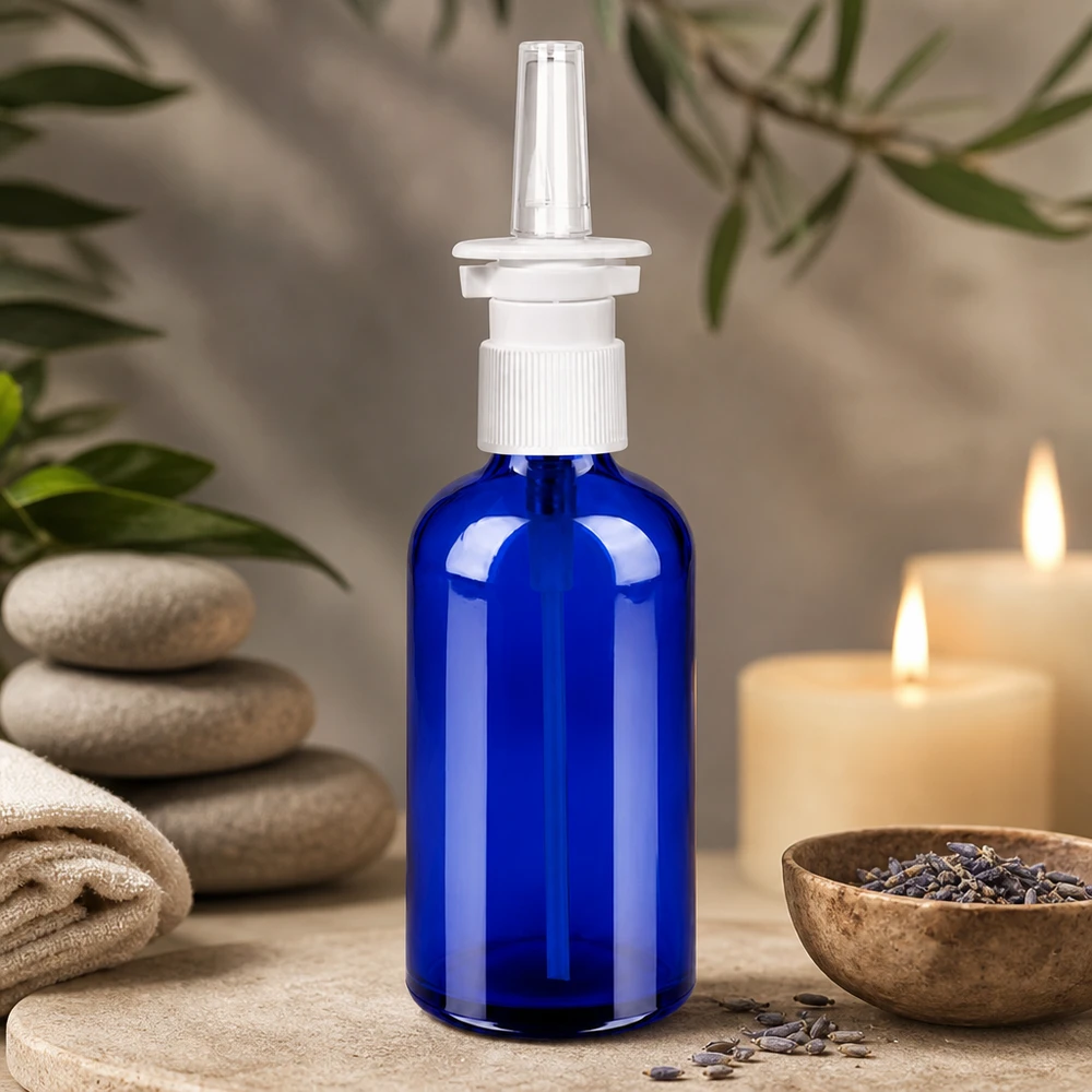 Lääketieteellinen lasipullo 100ml, jossa on tarkka nenäsuihkujärjestelmä terapeuttisiin sovelluksiin.