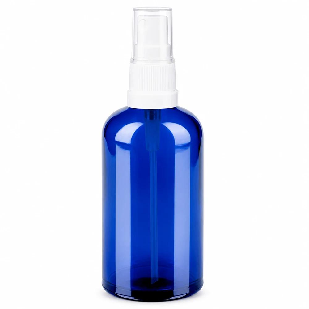 100ml sininen lasipullo valkoisella suihkupäällä kosmetiikkaan ja aromaterapiaan.