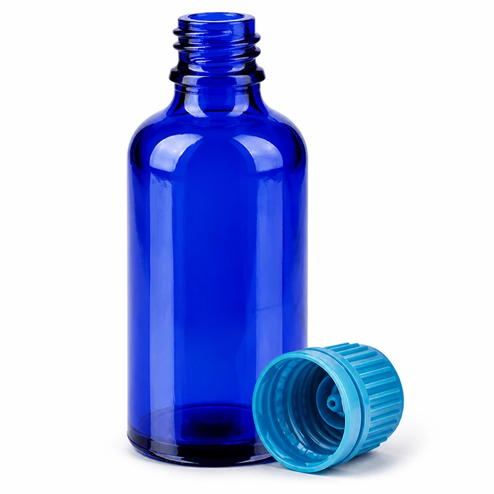 Sininen 50 ml:n lasinen laboratoriopullo, jossa on turkoosi korkki farmaseuttisiin sovelluksiin.
