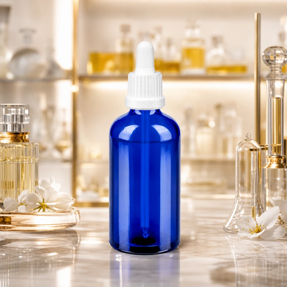 100ml pipettipullo valkoinen väärentämisen estävä suljin BlueLine UT18/100 100ml meripihkanvärinen lasipullo, jossa pipetti BlueLine UT18/100 valoherkille aineille.