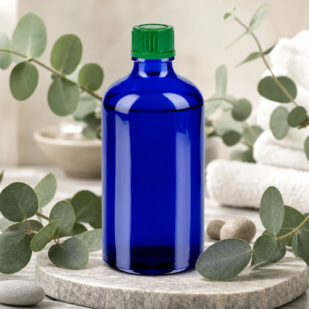 100ml apteekkipullo koboltinsininen, jossa vihreä korkki ammattikäyttöön.