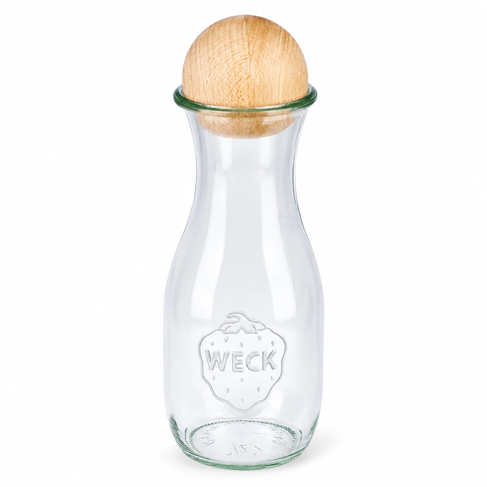 530ml mehupullo WECK RR60, jossa on puupallo pyökki 530ml WECK mehupullo RR60 lasista, jossa puupallo pyökki sulkimella läpinäkyvä lasipullo WECK-logolla.