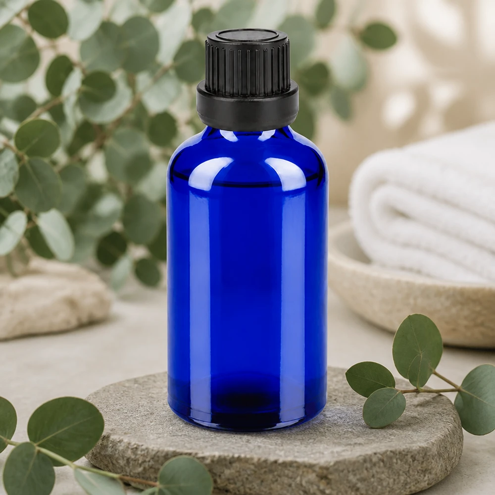 50ml pullo 11mm kierrekorkki musta väärentämisen estävä korkki BlueLine UT18/50 Pienikokoinen 50ml lasipullo koboltinsininen, jossa on musta ruuvikorkki säilytystä varten.