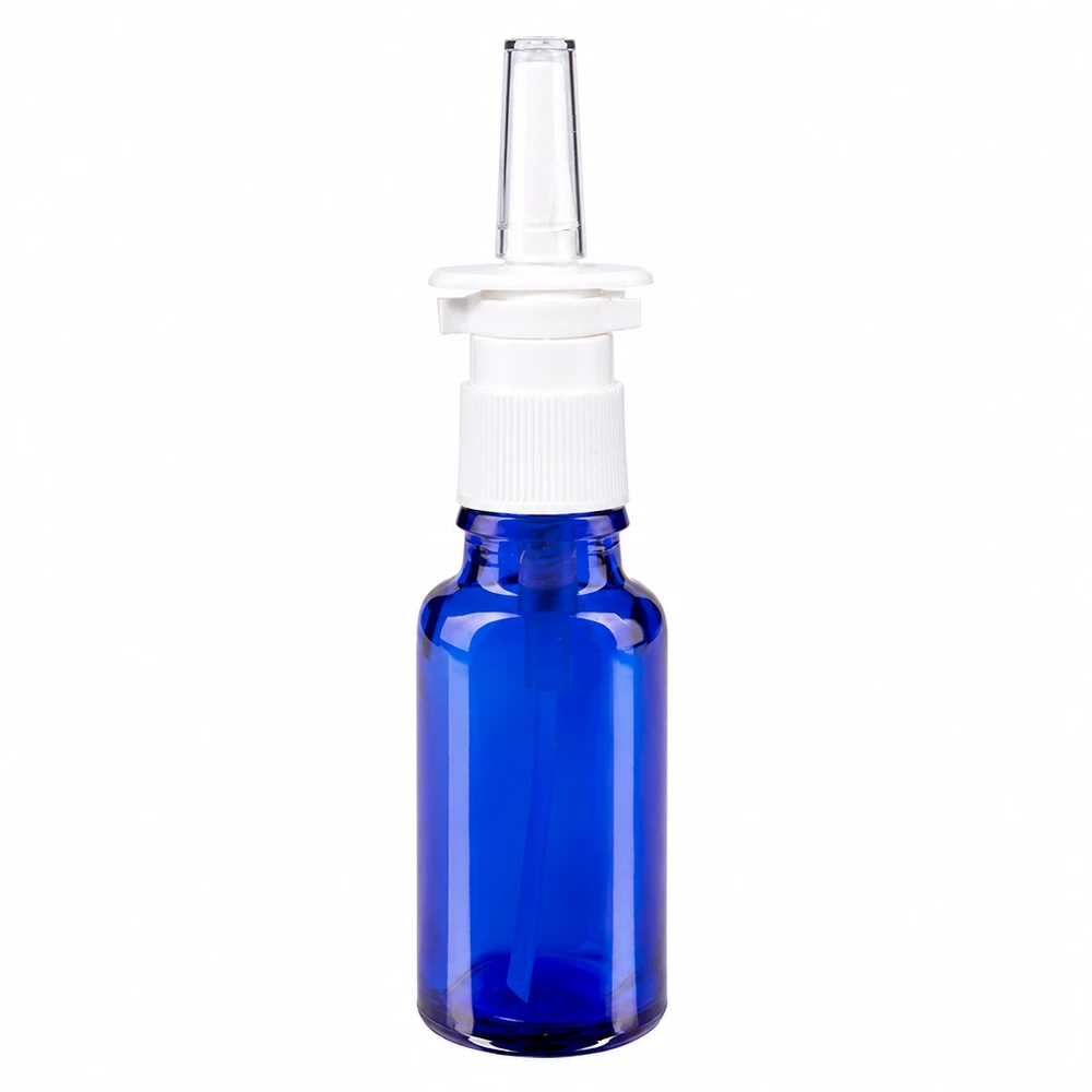 Apteekkipullo sininen 20ml nenäsumutinkorkki valkoinen std. 20 ml:n sininen lasipullo, jossa on valkoinen nenäsumutteen suutin ja läpinäkyvä suutin, apteekeille