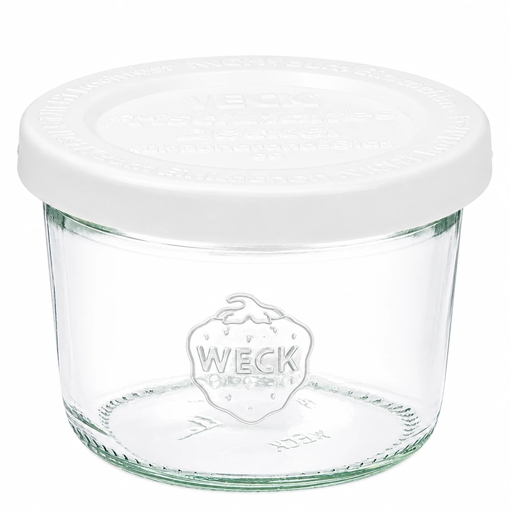 80ml WECK-lasipullot, joissa on valkoinen raikkauskansi RR60 kirkkaasta lasista, jossa on WECK-logo, säilytykseen ja varastointiin.