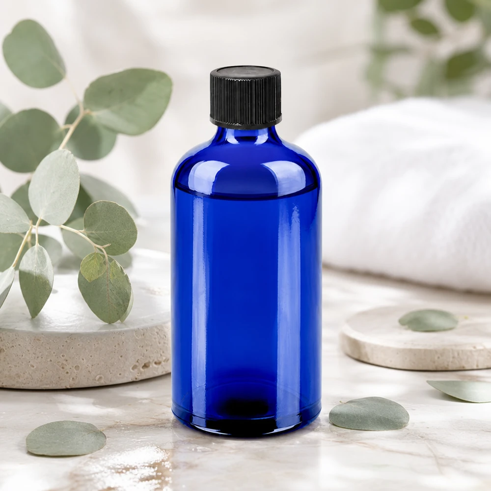 Laadukas sininen lasipullo 100ml, jossa on tarkka 1mm tippaputki aktiivisten ainesosien optimaalista annostelua varten.