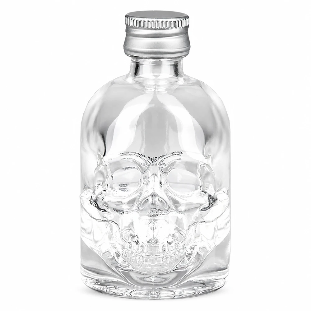 50ml Glasflasche "Hector" + Schraubverschluss silber UNiTWIS 50ml Hector-lasipullo, jossa on pääkalloreliefi ja hopeinen UNiTWIS-kierrekorkki valkoisella pohjalla.