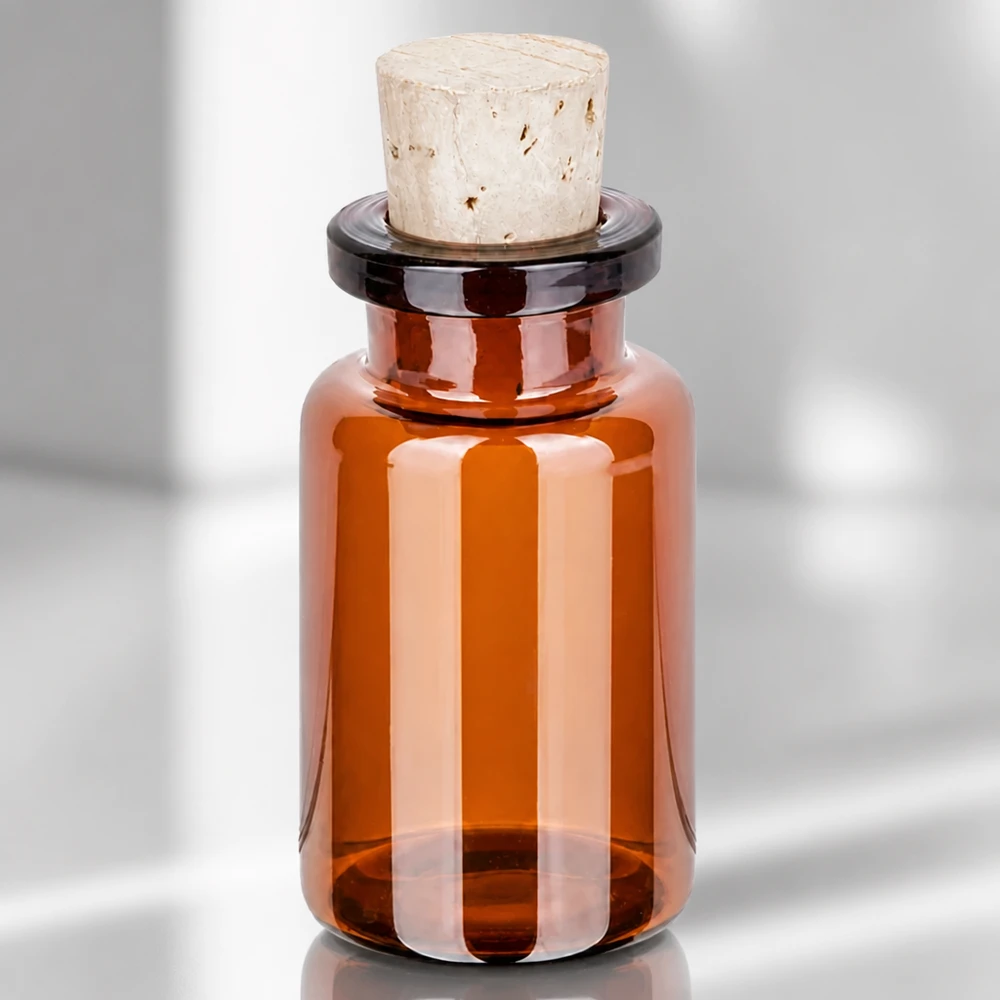Meripihkanvärinen lasipullo 10ml, korkki 11/14mm. Handliche Braunglasflasche 10ml mit konischem Naturkorken für Homöopathie und Kräuteröle