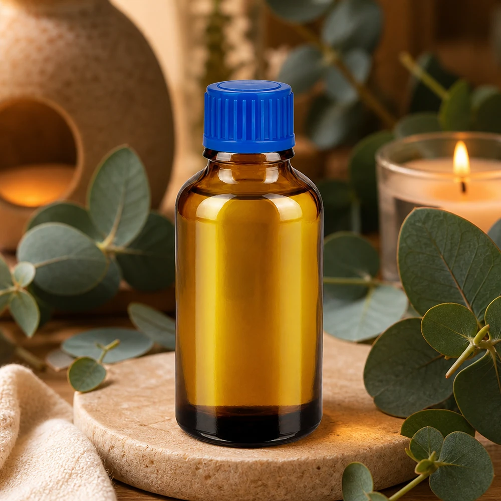 30ml apteekkipullo ruskeaa lasia, jossa sininen tippakorkki aromaterapiaa varten.