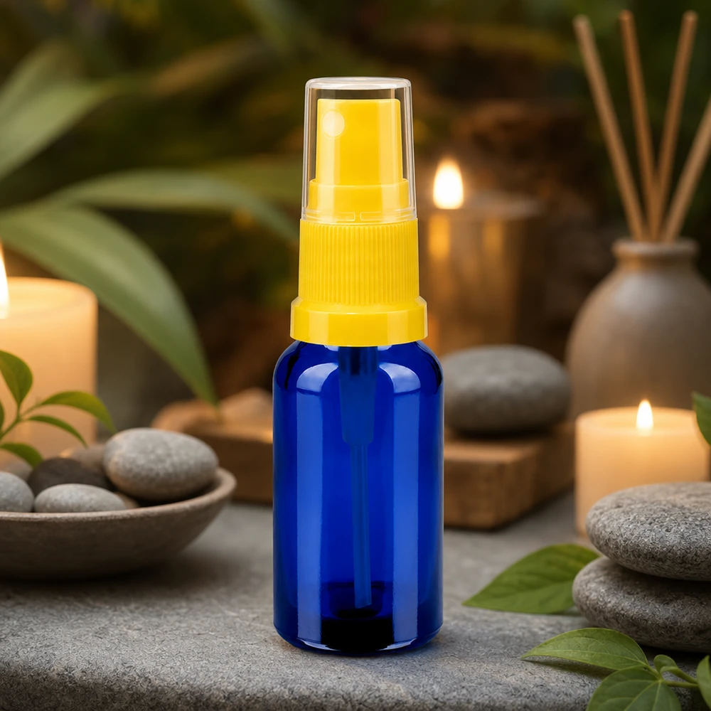 20ml suihkepullo keltainen/läpinäkyvä vakiokorkki BlueLine UT18/20 Laadukas 20ml suihkepullo, jossa on läpinäkyvä suihkepää BlueLine UT18/20 aromaterapiaan