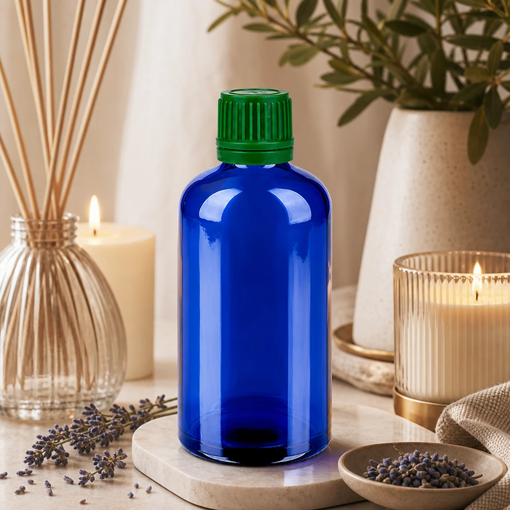 100ml violetti lasipullo, jossa on UV-suoja ja vihreä korkki valolle herkille aineille.