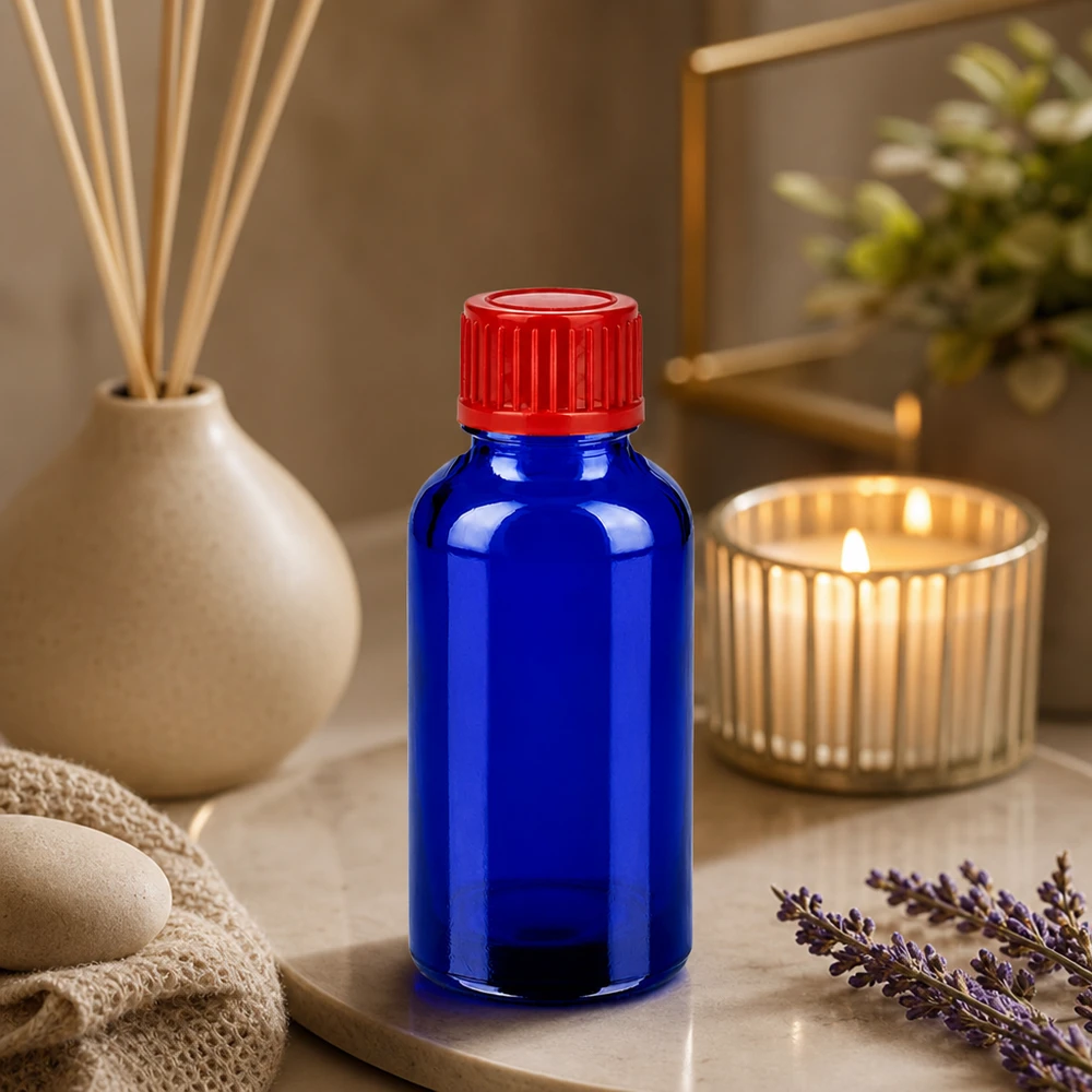Vankka 30 ml:n lasipullo, jossa on UV-suoja sinisen lasin ja turvallisen punaisen korkin ansiosta.