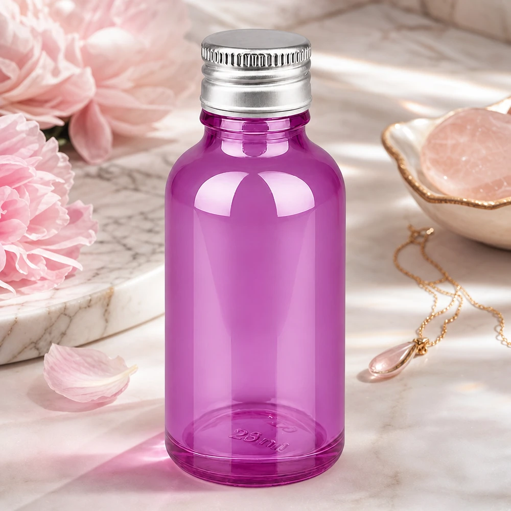 Läpinäkyvä violetti lasipullo 30ml, jossa on kiiltävä alumiinikorkki aromaterapiaa varten.