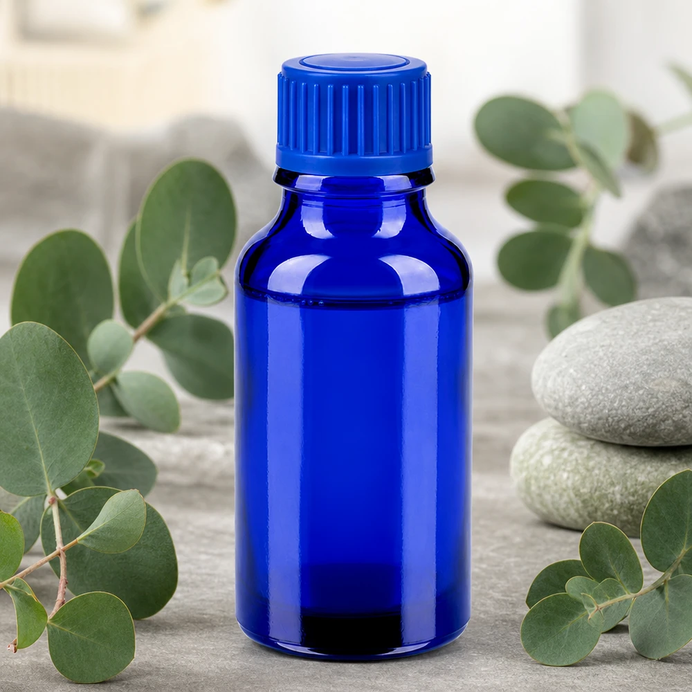 20ml apteekkipullo, valmistettu UV-suojalasista, sinisestä lasista, jossa on uurrettu kierrekorkki.