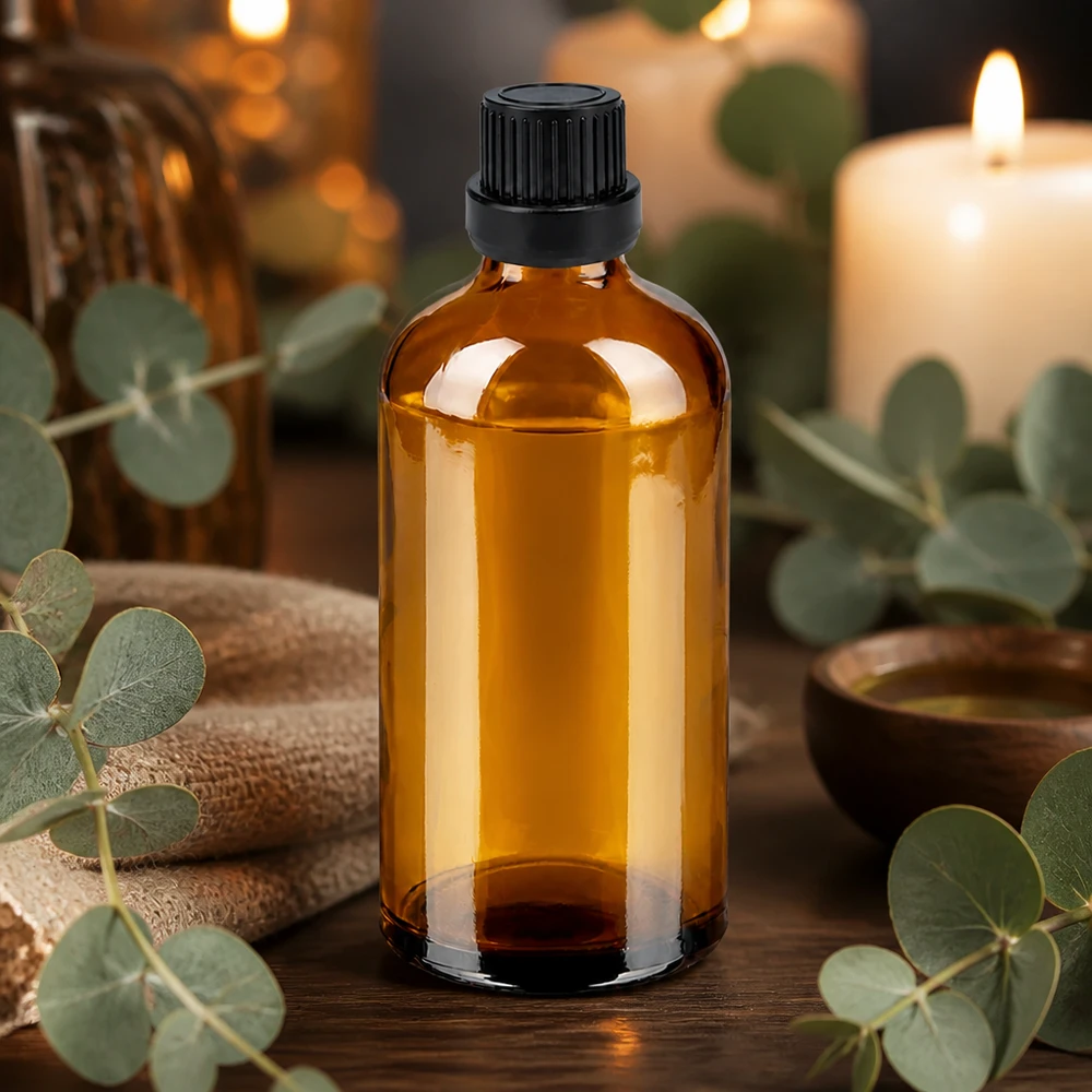 Korkealaatuinen 100ml meripihkanvärinen lasipullo UV-suojalla ja mustalla korkilla aromaterapiaa varten.