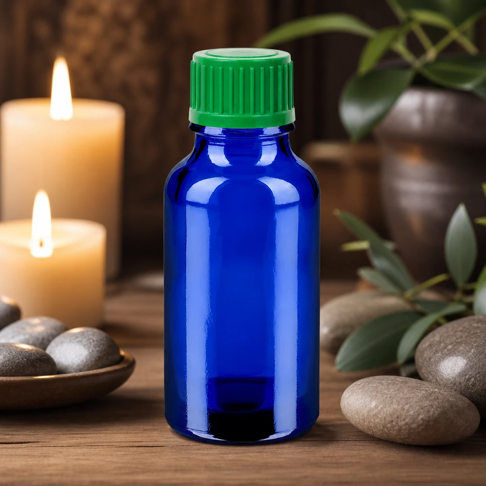 20 ml:n lääkepullo korkealaatuista sinistä lasia, jossa on tipputiivis vihreä korkki STD BlueLine.