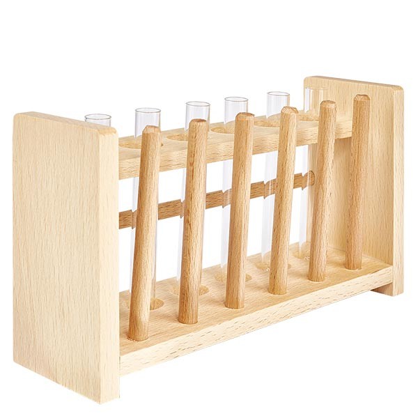 Puinen koeputkiteline, jossa on 6 koeputkea sekä soodakalkki 100x12.