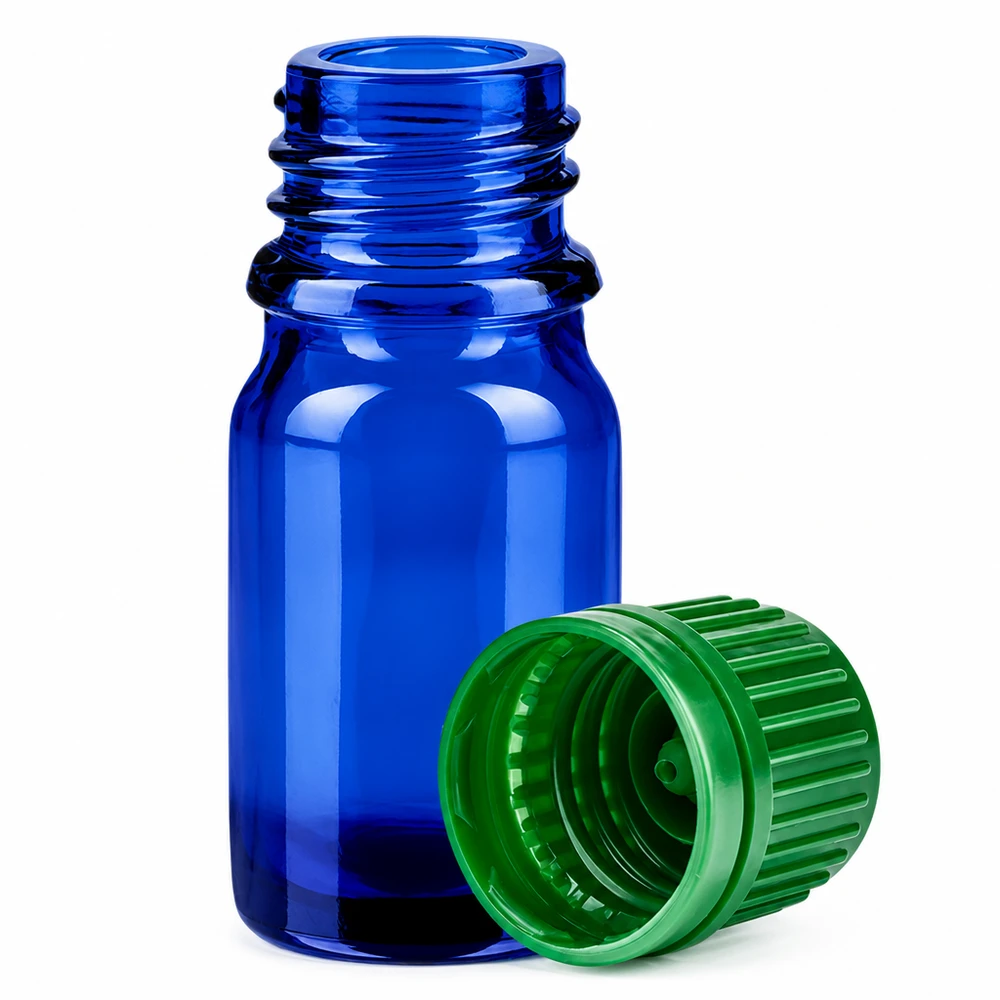 Sininen 5ml aromaterapiapullo vihreällä kannella tuoksuville öljyille ja esansseille.