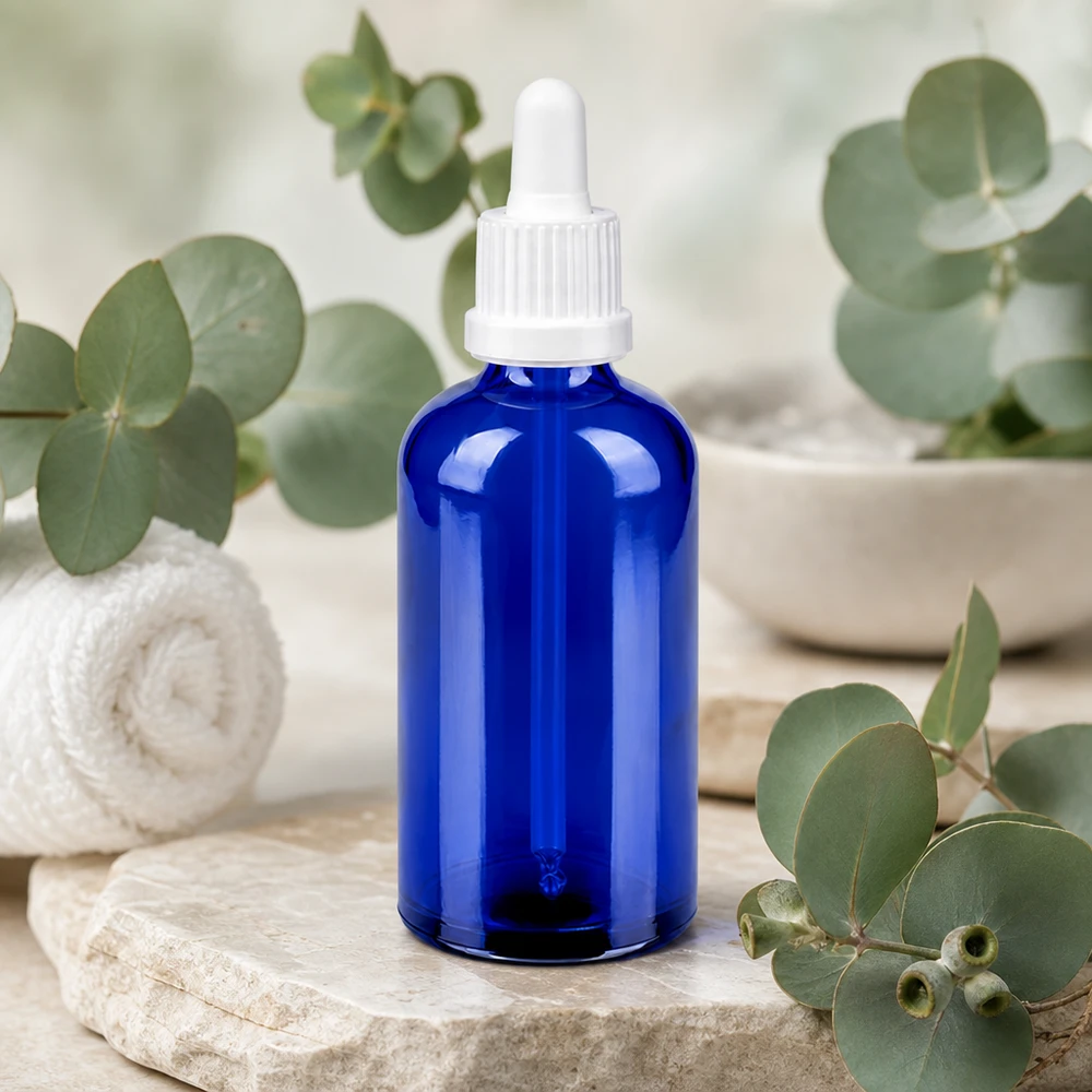 Ammattikäyttöön tarkoitettu pipettipullo 100ml sininen, jossa on tarkka tiputusjärjestelmä laboratorio- ja aromaterapiaan.