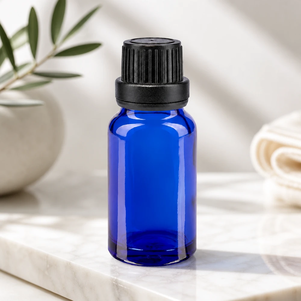 Apteekkipullo sininen 10ml tiputuskorkki kaaderengas 2mm musta peukaloitava korkki 10 ml:n sininen apteekkilasinen tiputuspullo, jossa on lapsiturvallinen OV-korkki ja tarkka 2 mm:n tiputusosa