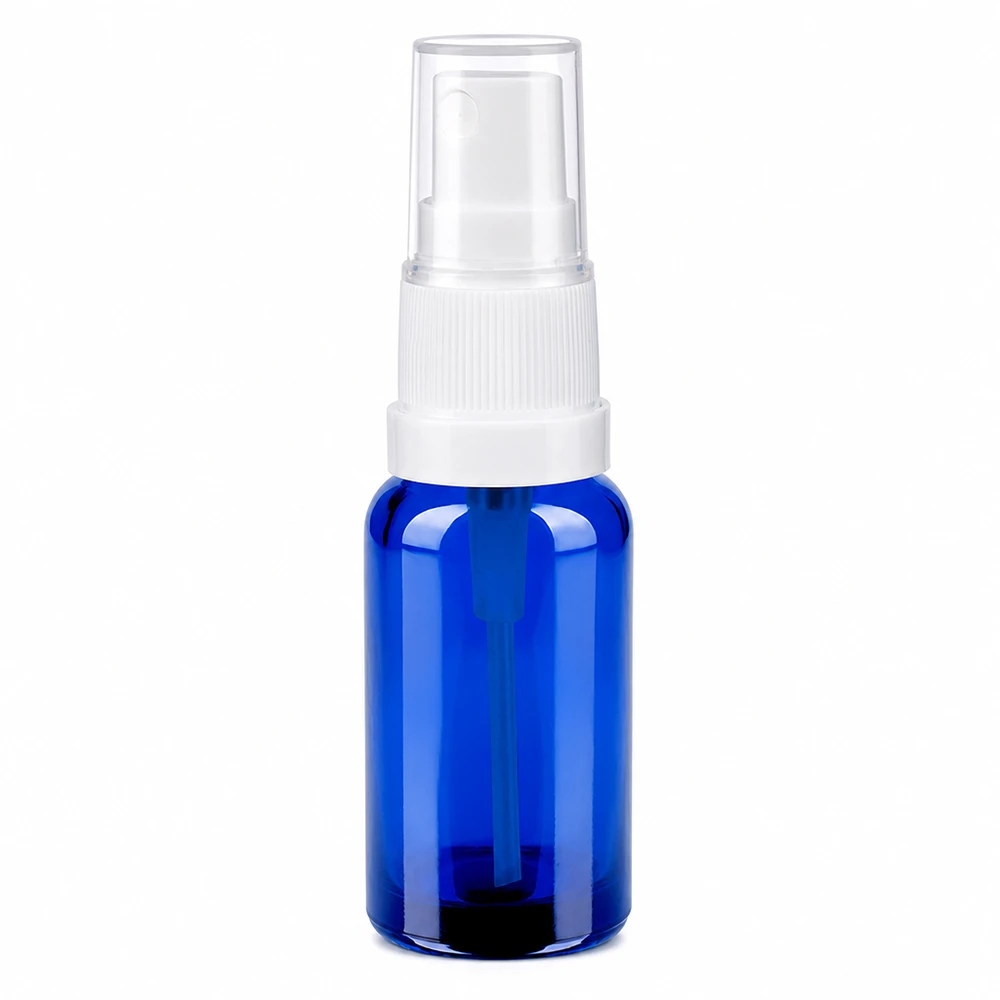 20ml sininen lasinen suihkepullo valkoisella suihkepäällä kosmetiikalle ja eteerisille öljyille.