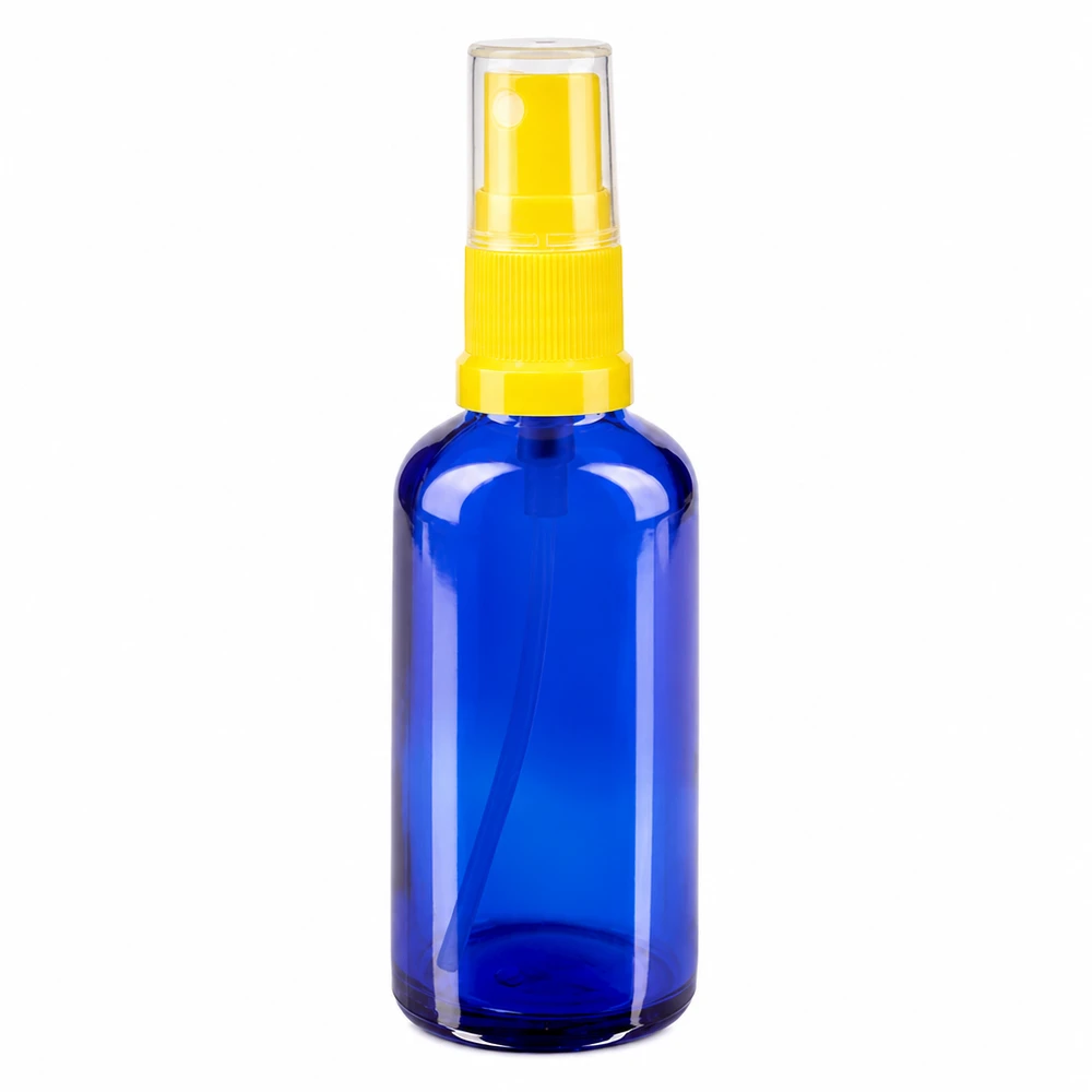 Apteekkipullo sininen 50ml suihkepullon korkki keltainen 50 ml:n sininen lasinen suihkepullo, jossa on keltainen suihkukärki, apteekkeihin ja kosmetiikkakäyttöön