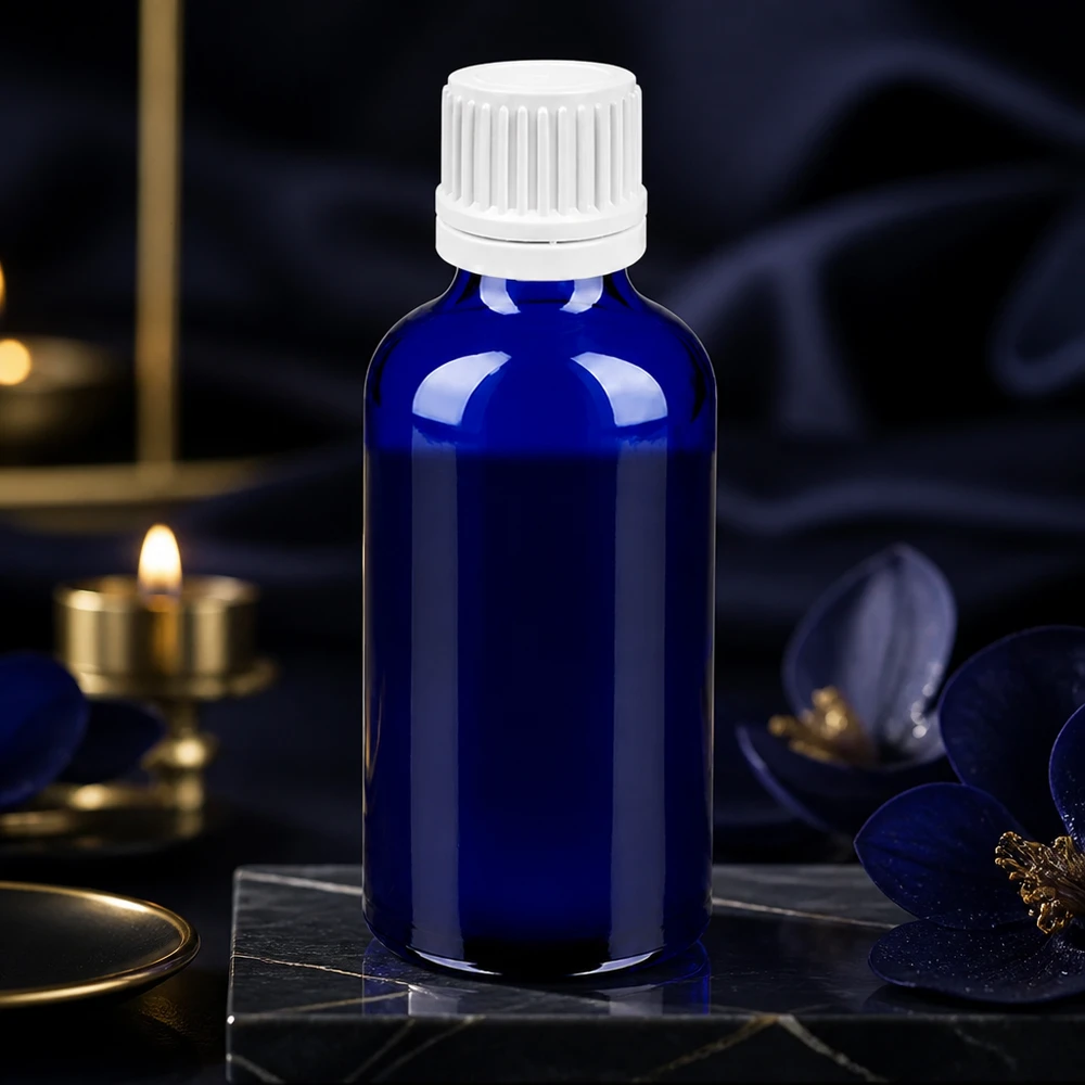 Premium 50ml kobolttilasinen tippapullo valkoisella UT18-korkilla korkealaatuisille luonnontuotteille.