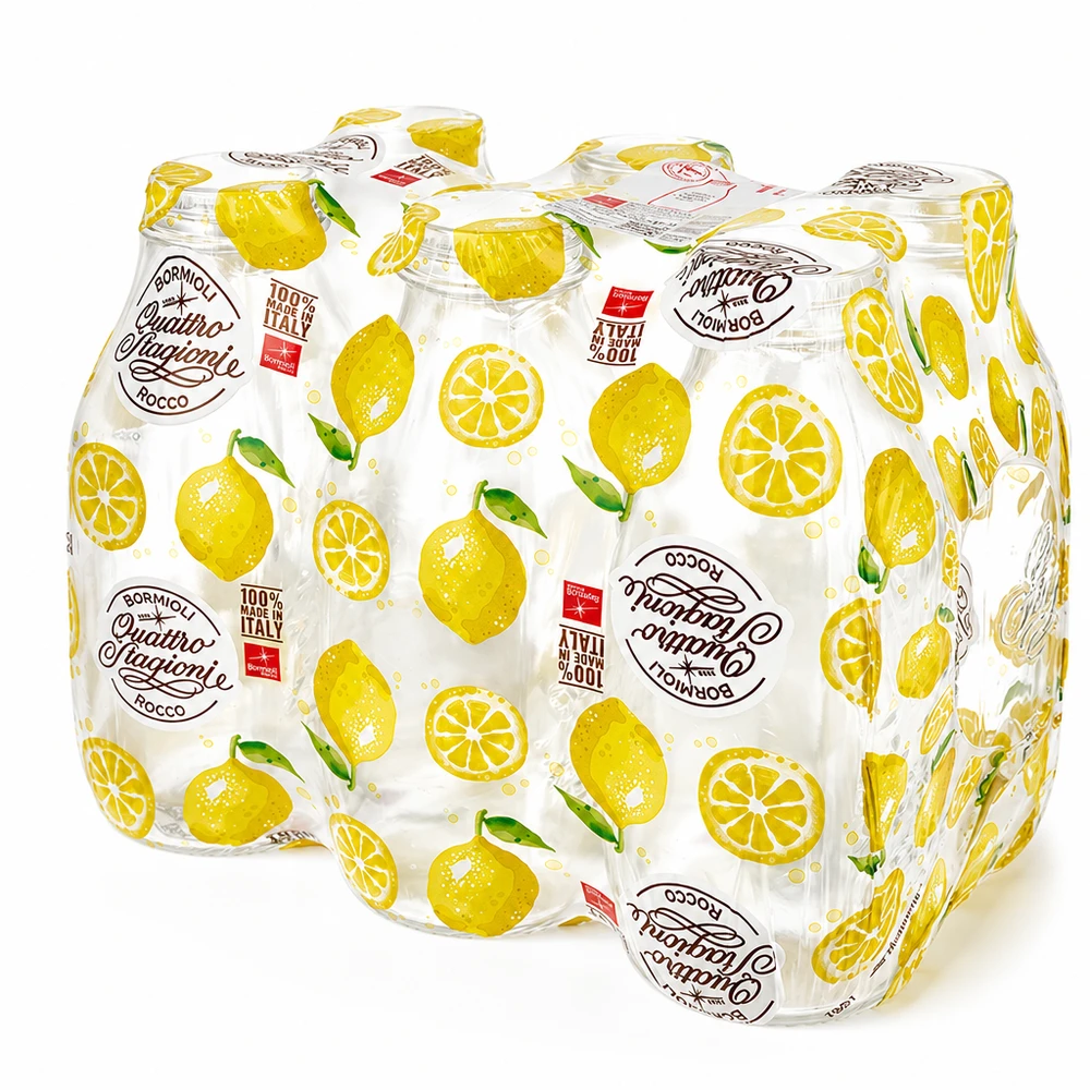6 Quattro Stagioni -lasipullon pakkaus 1000 ml, folioon kääritty, Bormioli Rocco -maitopullot, joissa on sitruunakuvioinen kuvio.