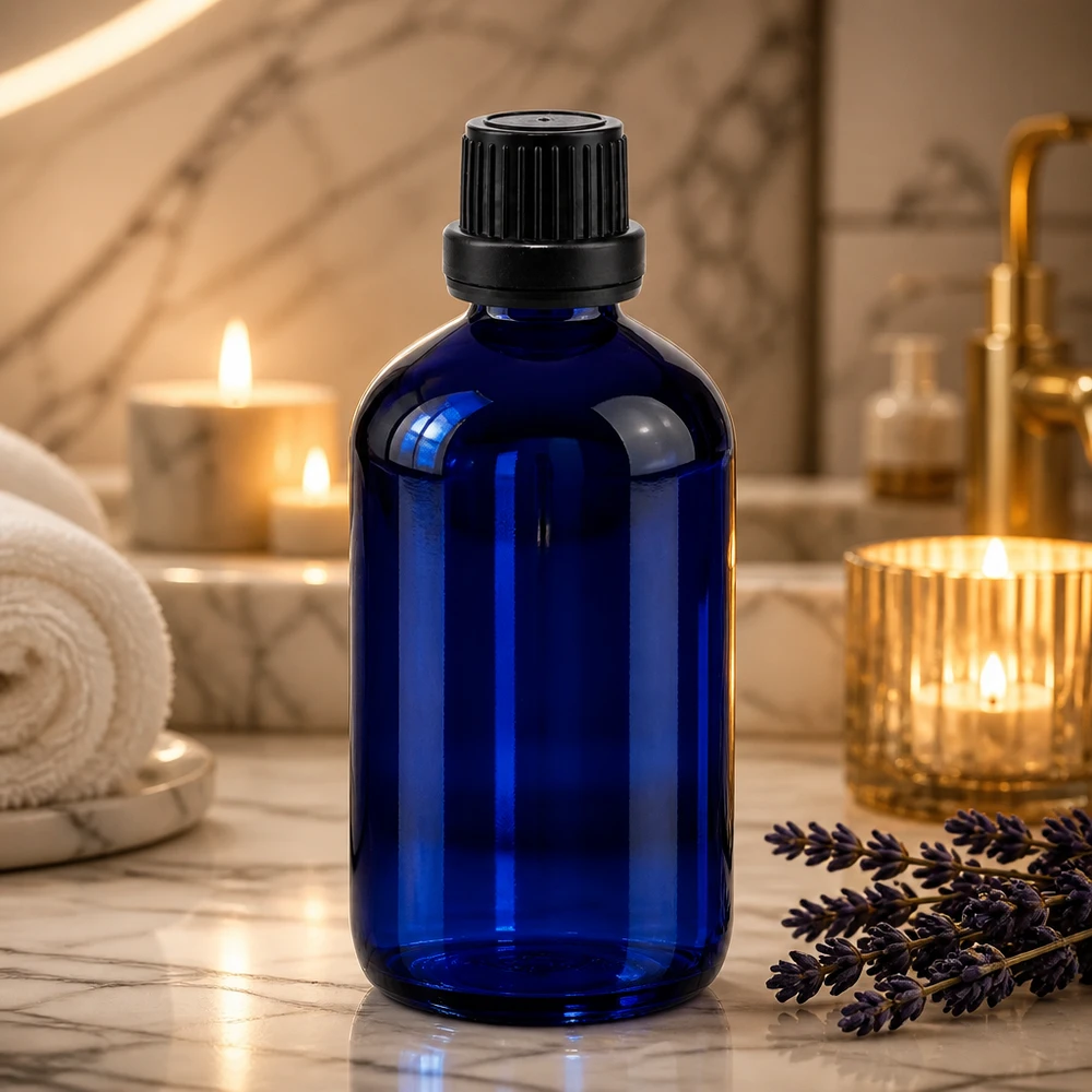 Apteekkipullo sininen 100ml ruuvikorkki musta näpistysvarma suljin 100 ml:n sininen lasipullo, jossa on alkuperäiskorkki ja tiputusosa aromaterapiaa varten