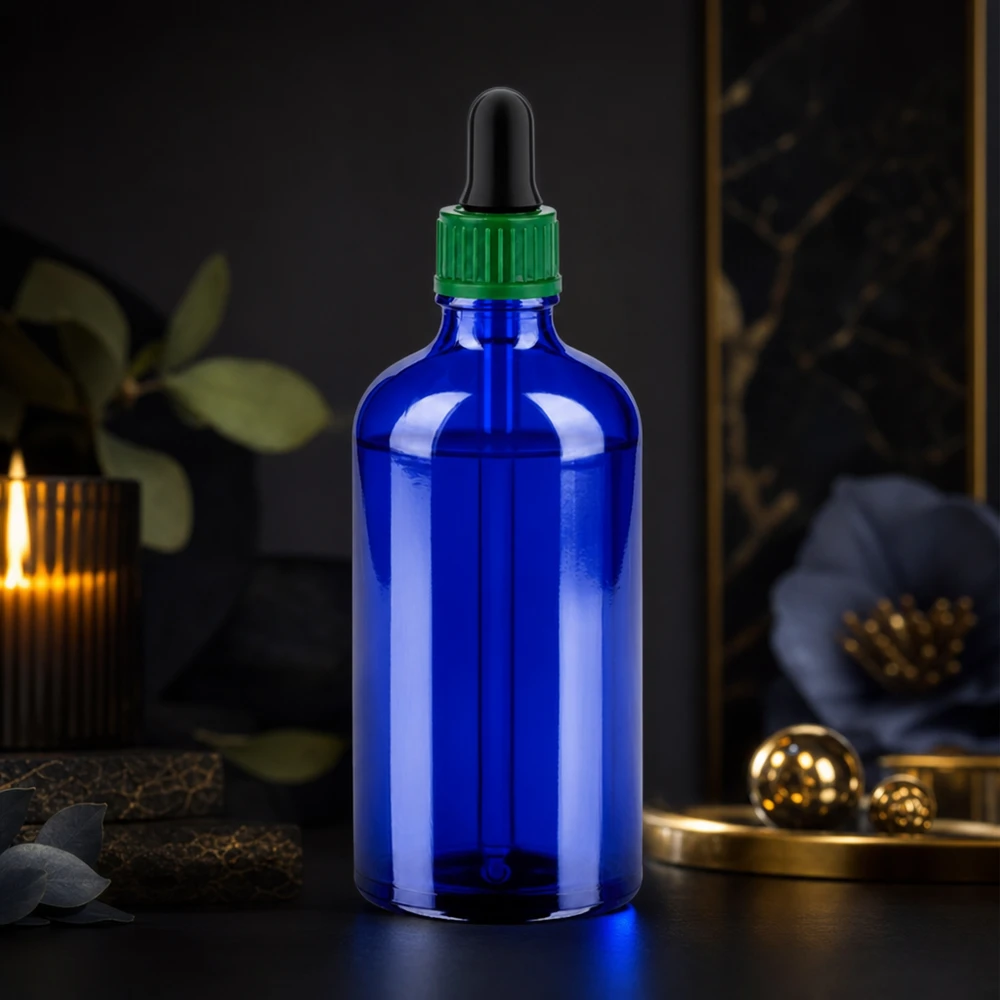 Tyylikäs 100ml tippapullo koboltinsinisellä pipetillä seerumien tarkkaan annosteluun.
