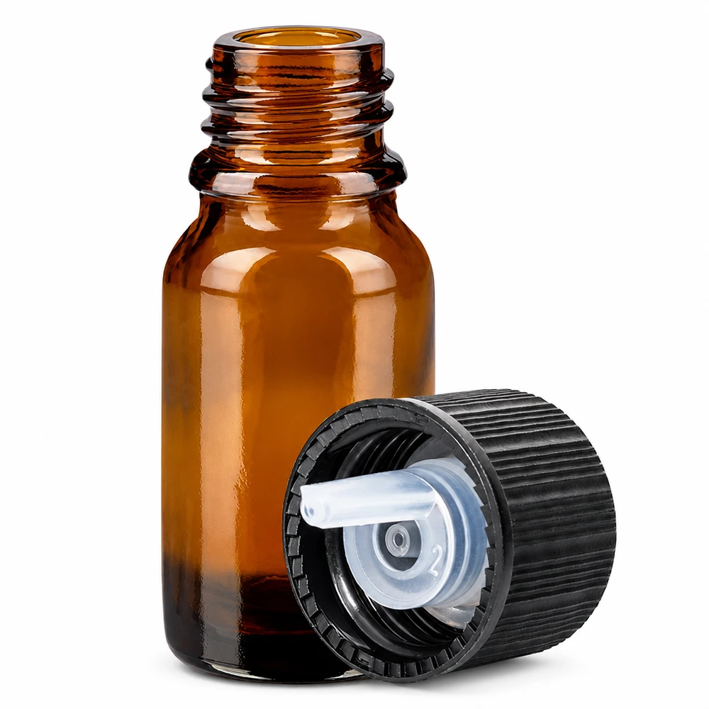 Ruskea lasipullo 10ml mustalla tippakorkilla nesteiden tarkkaa annostelua varten.