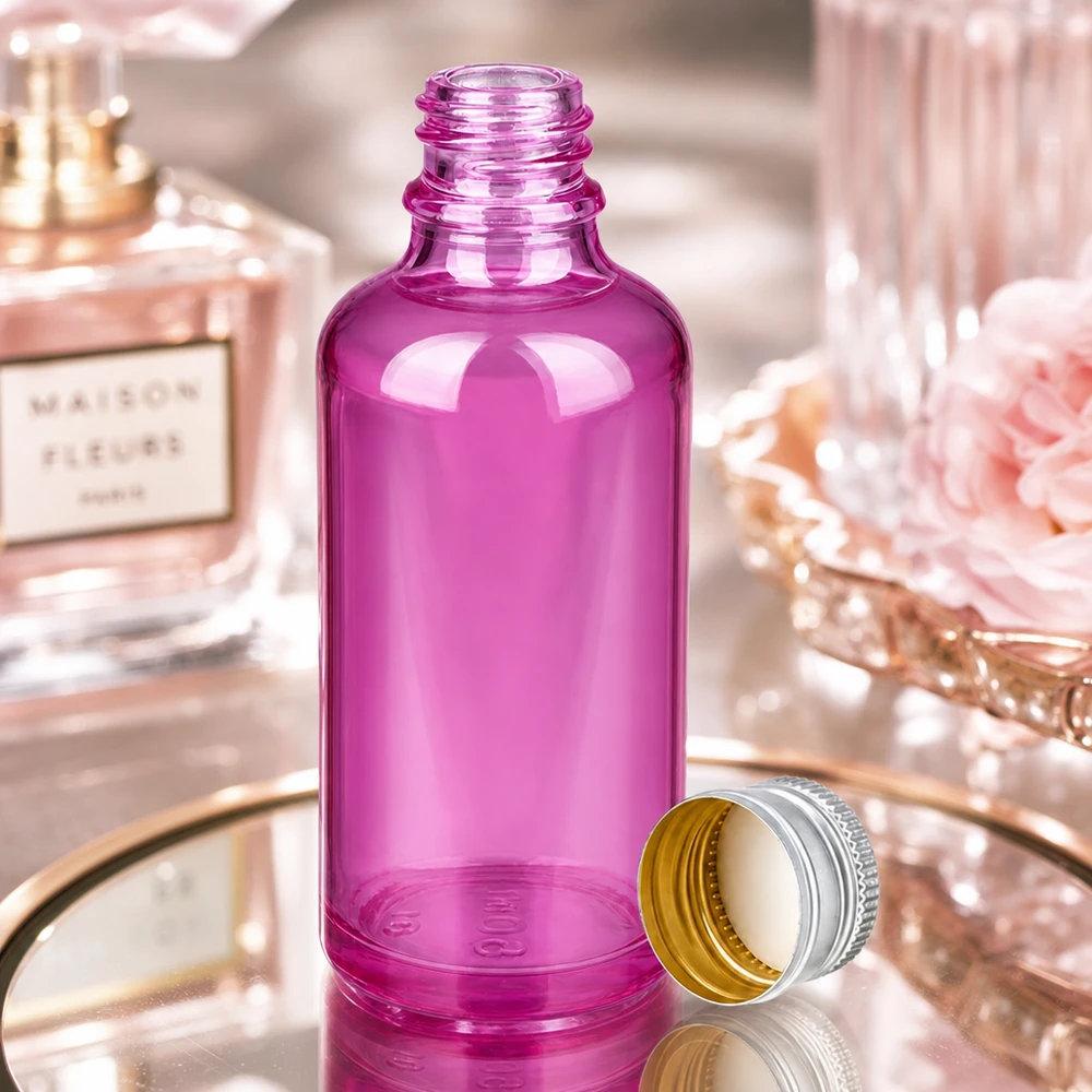 Elegantti 50ml violetti lasipullo, jossa on ensiluokkainen alumiini-hopea korkki ylelliselle kosmetiikalle.