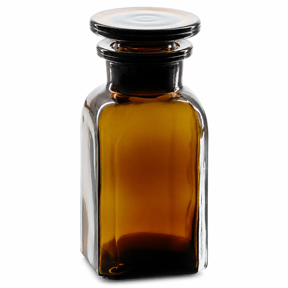100 ml:n ruskea neliömäinen pullo, jossa on lasikorkki ja leveä kaula, laboratorio- ja apteekkikäyttöön