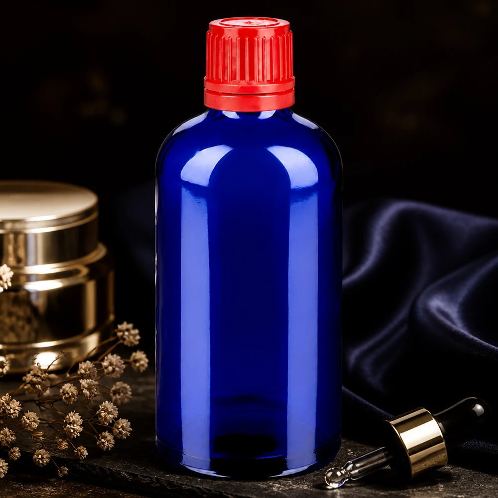 100ml pullo 11mm kierrekorkki punainen väärentämisen estävä sulkeminen BlueLine UT18/100 Elegantti 100ml BlueLine UT18 tippapullo kobolttilasista, jossa on punainen korkki, joka on varmennettu väärentämisen varalta.