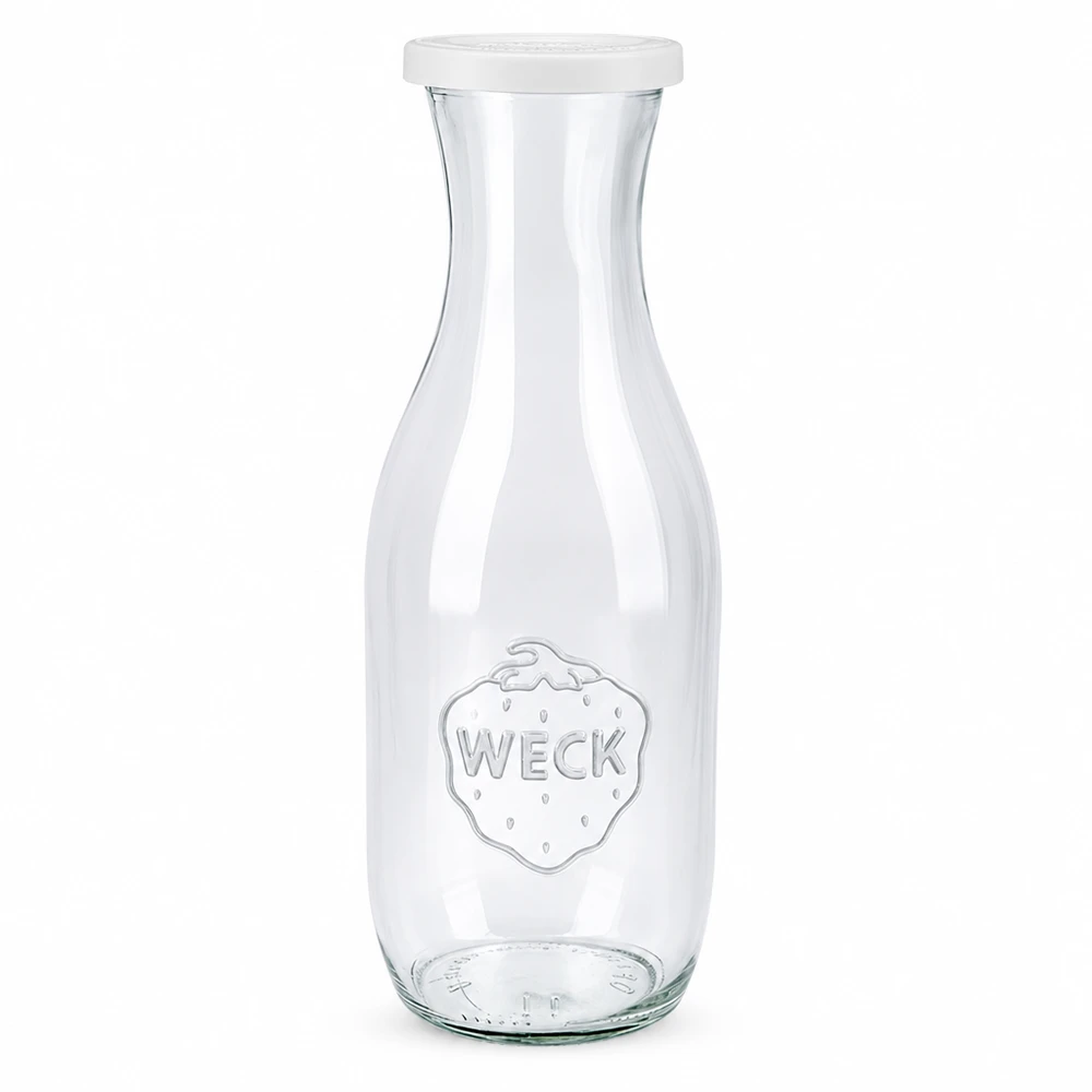 WECK mehupullo 1062ml lasista, jossa on valkoinen raikkauskansi ja WECK-logo mehuille ja juomille.
