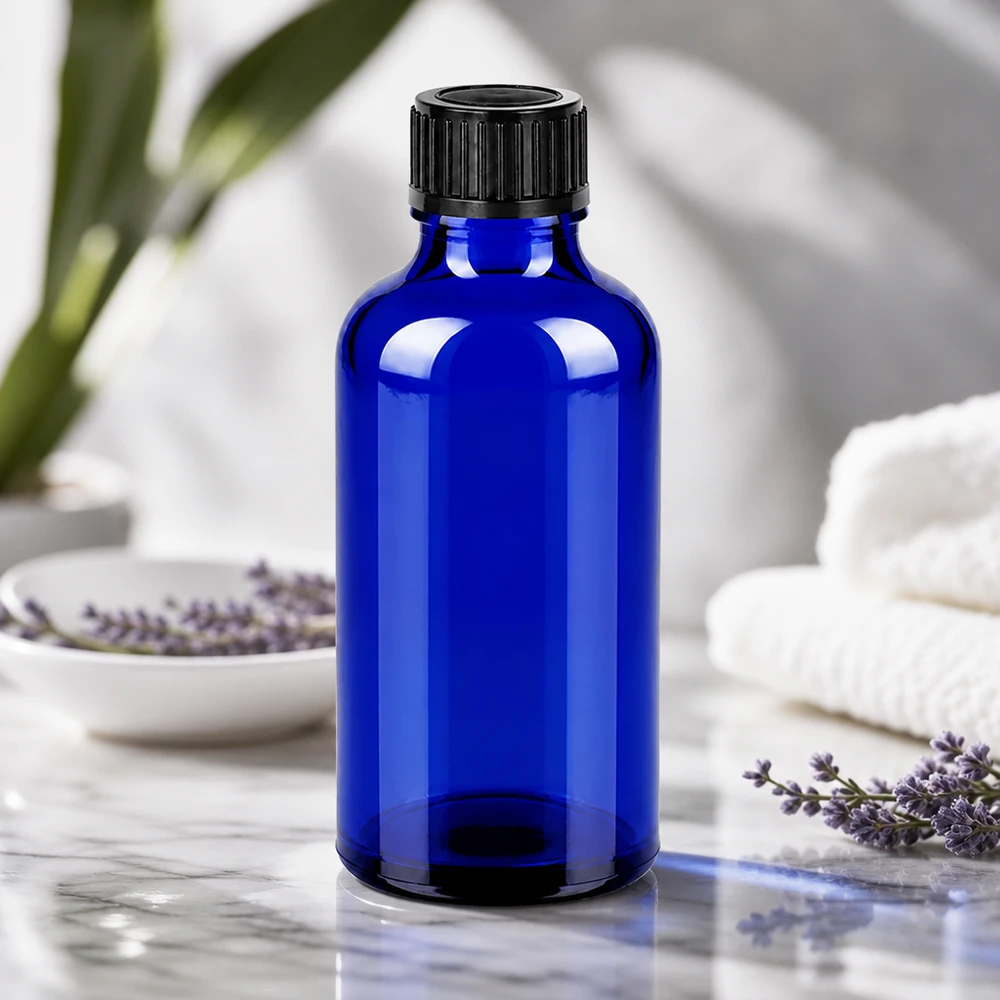 50ml apteekkipullo, valmistettu UV-suojatusta koboltinsinisestä lasista, jossa on musta, väärentämisen varmentava korkki.