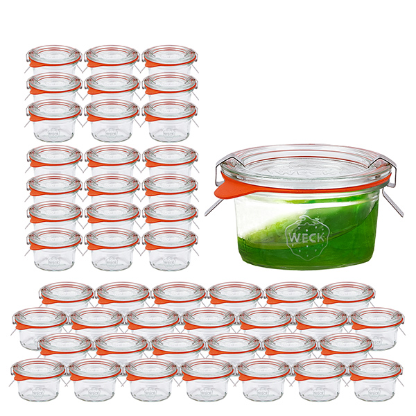 48 Weck 50 ml:n juomapullon setti, jossa on 48 lasikantta. 48 Weck 50 ml:n juomapullon setti, jossa on 48 lasikantta.