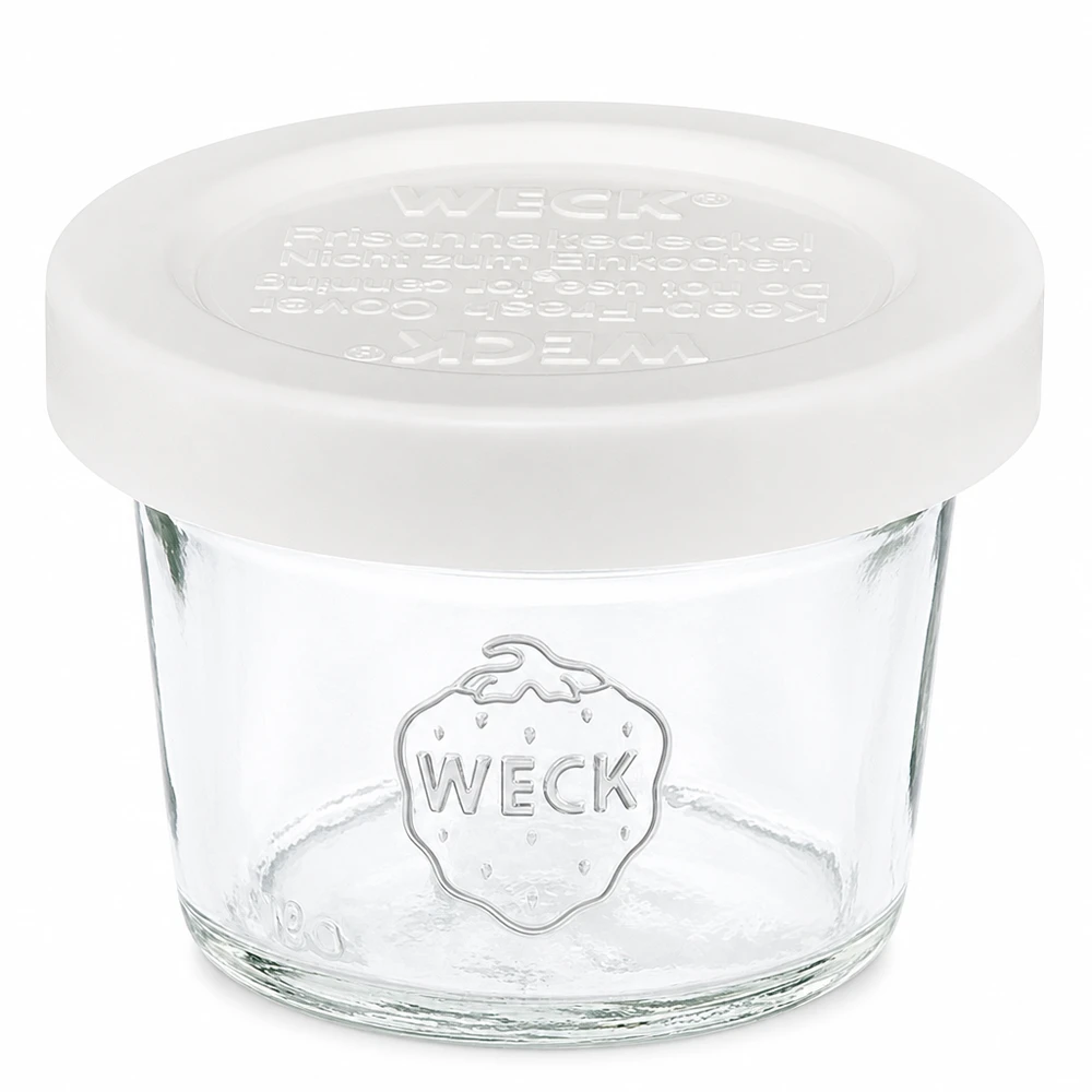 35ml lasipurkki, jossa on kansi WECK RR40 35ml WECK RR40 muuripurkki valkoisella kannella, pieni lasinen säilöntäpurkki hilloille ja levitteille.