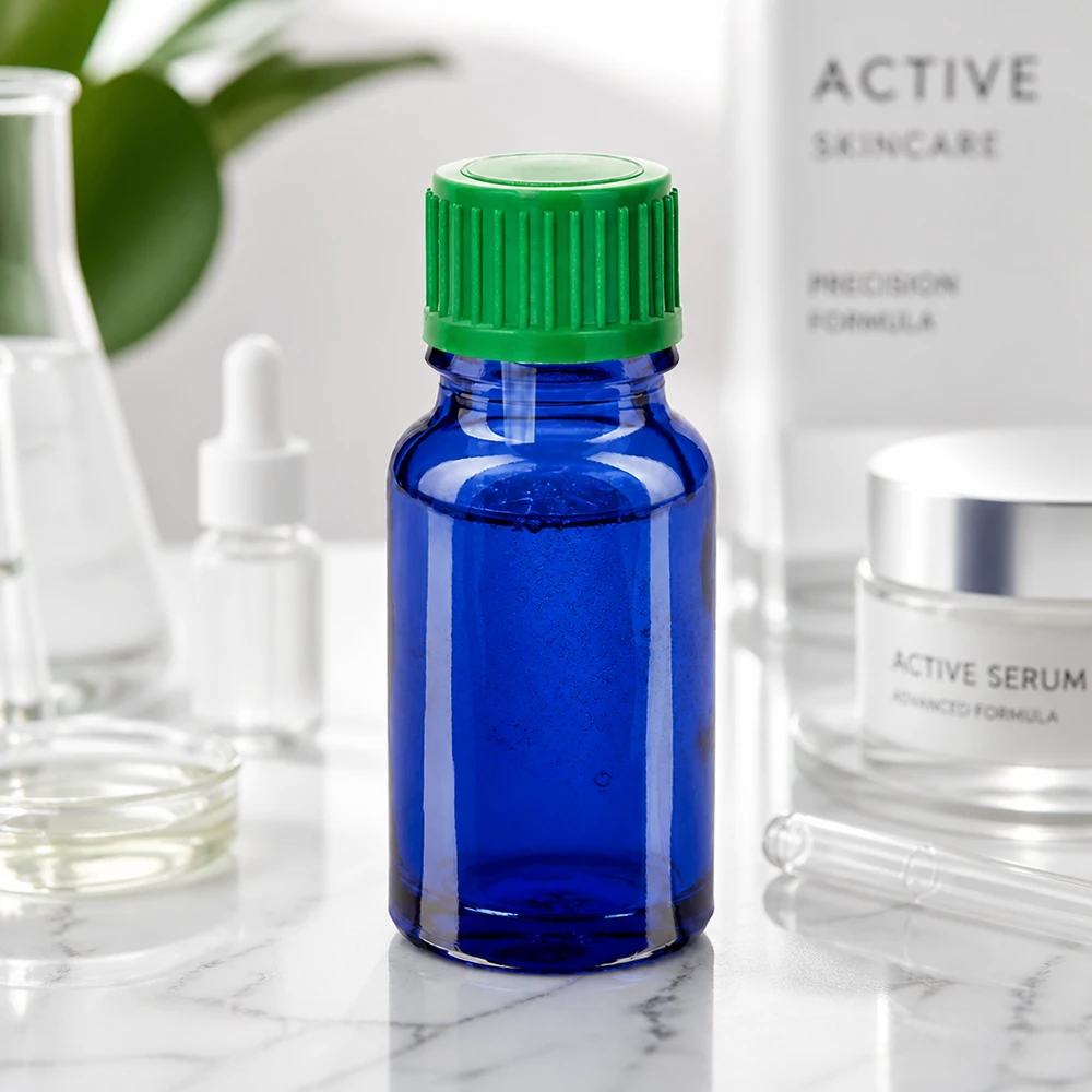 10ml tippapullo 0,8mm vihreä vakiokorkki BlueLine UT18/10 BlueLine UT18/10 10ml lasipullo sininen vihreällä tiputuskorkilla UT18 kosmetiikkaan ja seerumeihin.