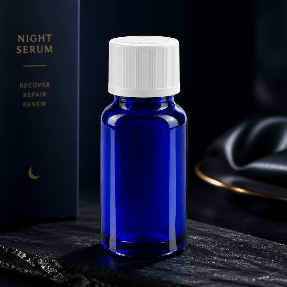 Apteekkipullo sininen 10ml kierrekorkki valkoinen lapsiturvallinen vakio Sininen 10 ml:n apteekkipullo, jossa on valkoinen lapsiturvallinen korkki, Night Serum -tuotteen pakkauksessa