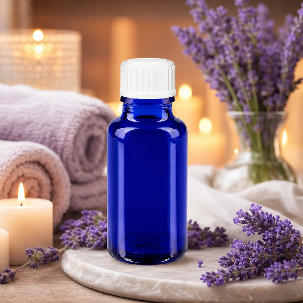 Apteekkipullo sininen 20ml ruuvikorkki valkoinen standardi Sininen 20 ml:n lasipullo, jossa on valkoinen lapsiturvallinen korkki eteerisille öljyille