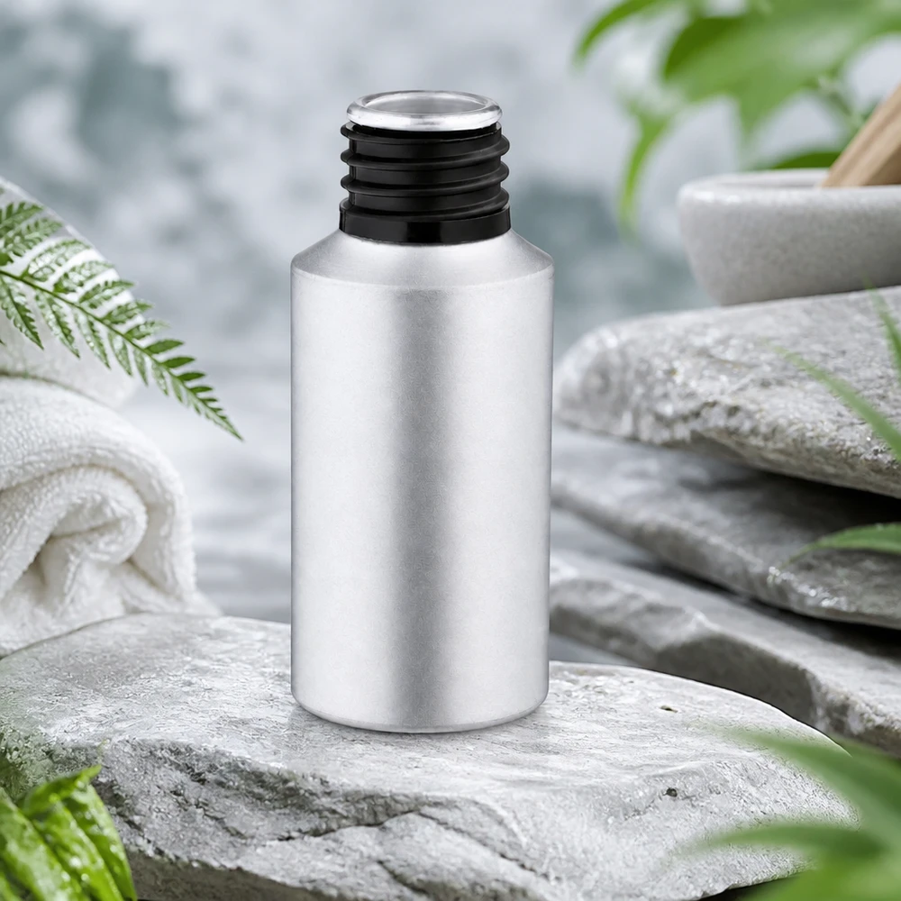 30ml värjätty alumiinipullo, jossa on leveä kaula seerumien ja öljyjen helppoa täyttämistä varten.