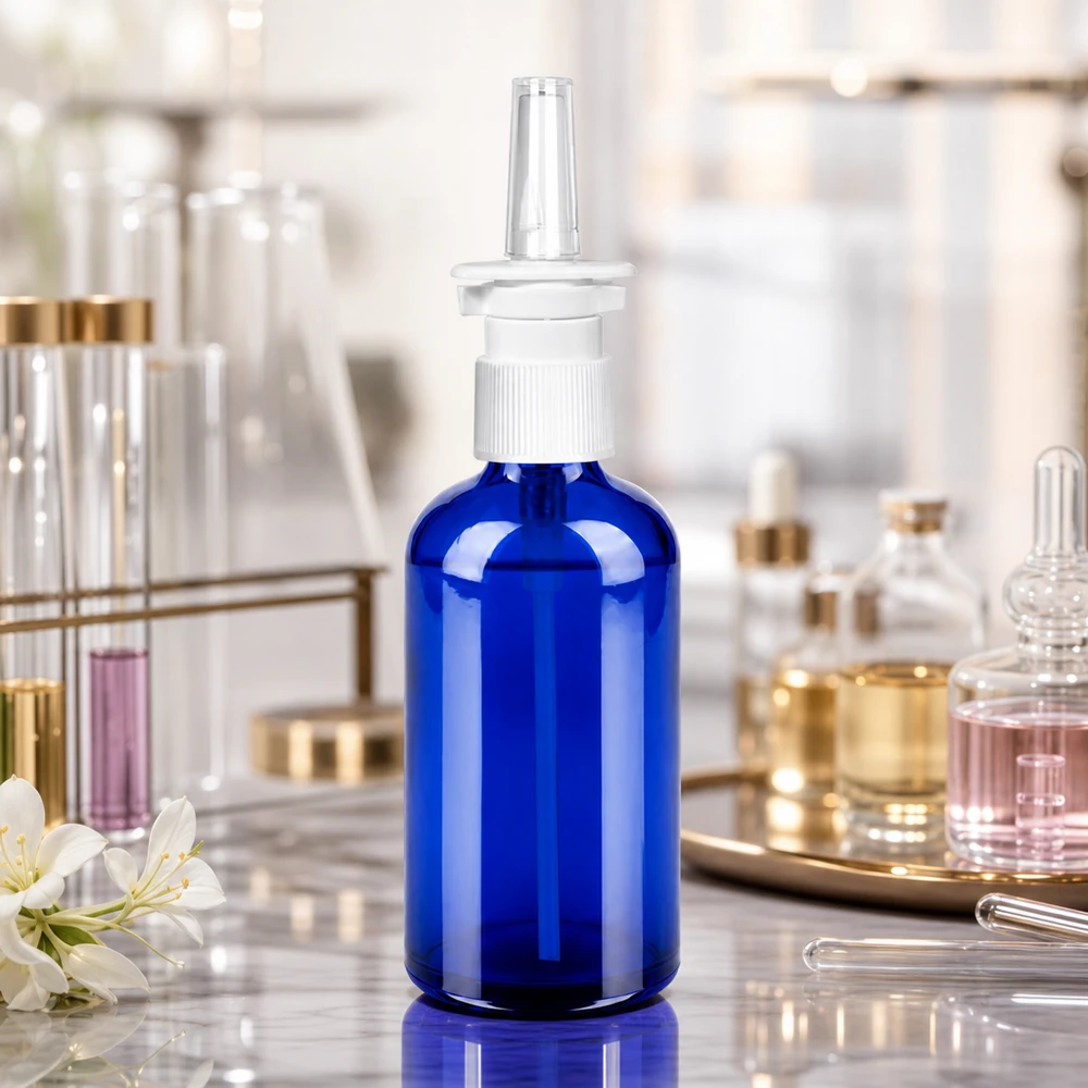 Laadukas 100ml lasipullo STD-kierteellä UT18/100 ammattimaiseen nenäsumutteiden valmistukseen.