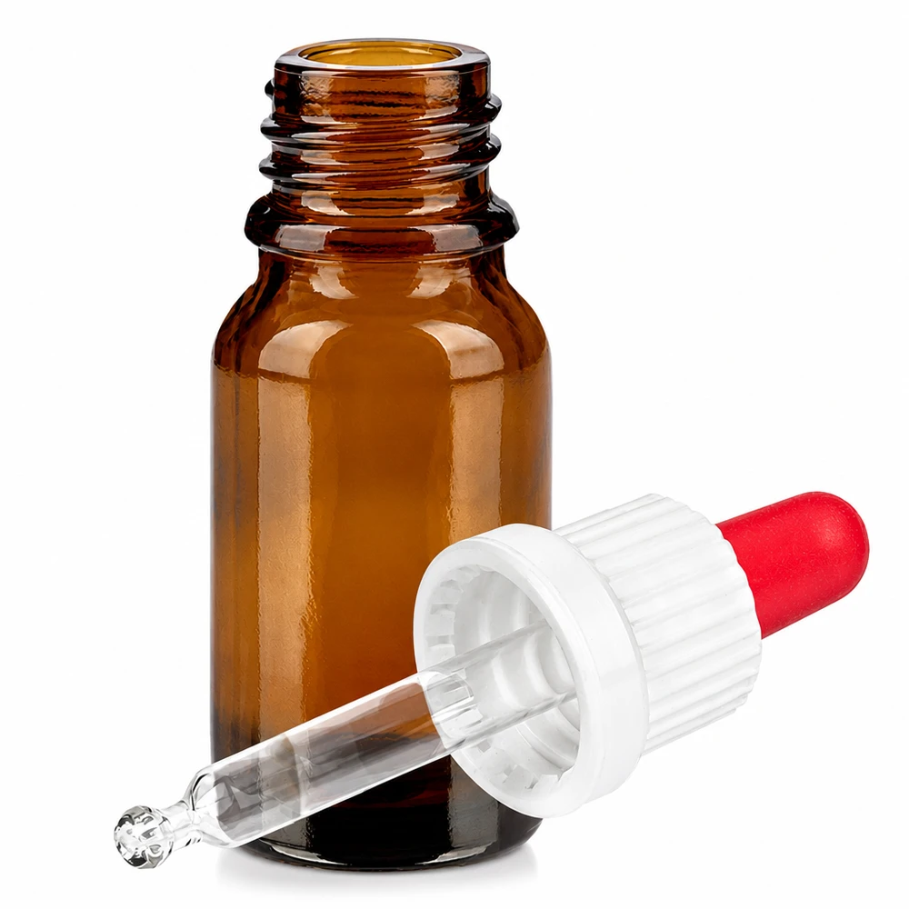 Ruskea 10ml lasipullo pipetillä ja punaisella tippapullolla eteerisille öljyille ja seerumeille.